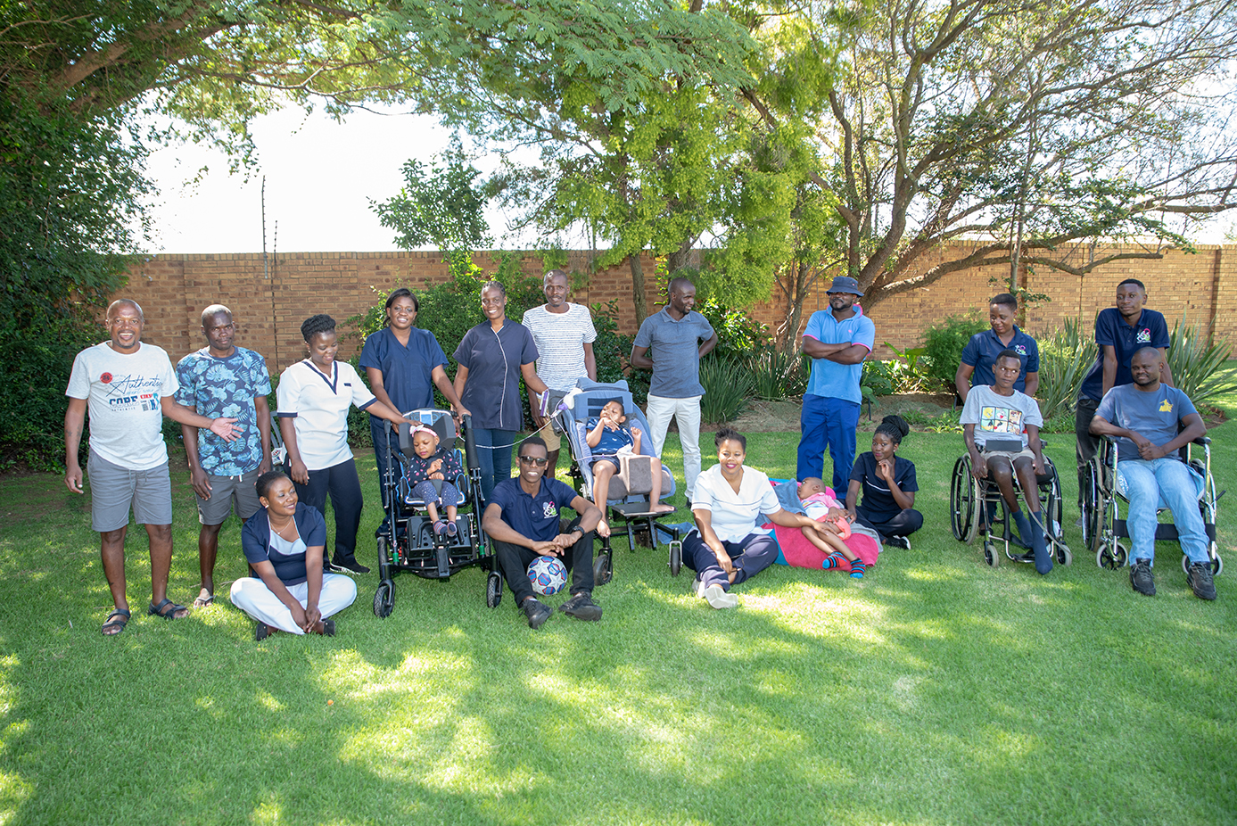 Our full team and residents enjoying the gardens